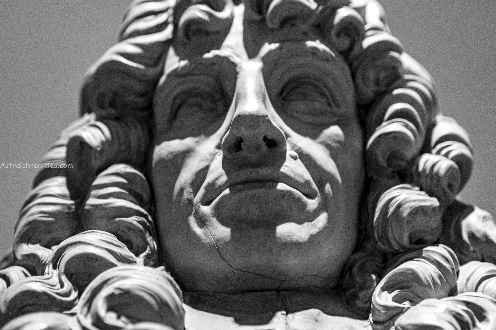 gray concrete statue of man